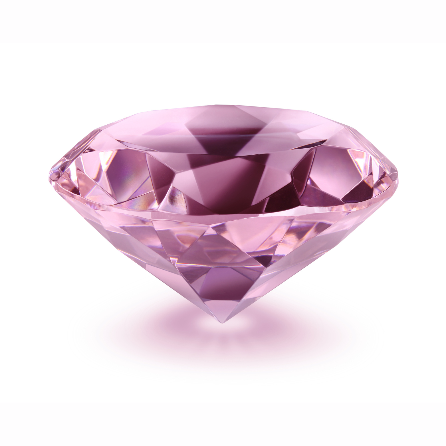 Pink diamond gemstone on a white background